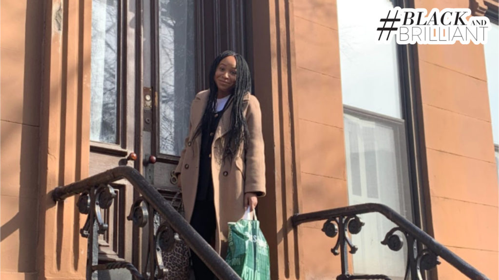 Perky Noah-Effik stood on the steps of a brownstone