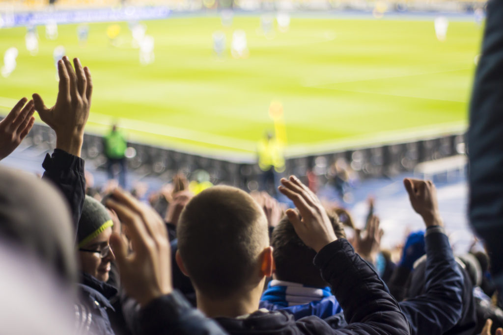 Fans at a Premier League match to mark the start of the new season
